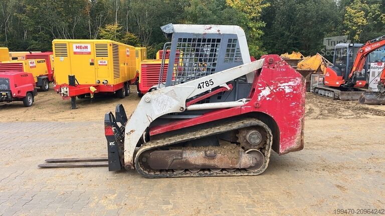 Kompaktlæsser på bælte Takeuchi TL130 with forks and loader bucket