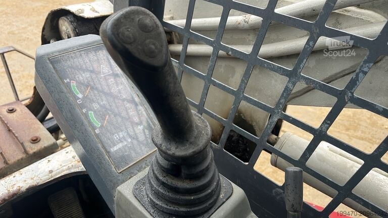 Kompaktlæsser på bælte Takeuchi TL130 with forks and loader bucket