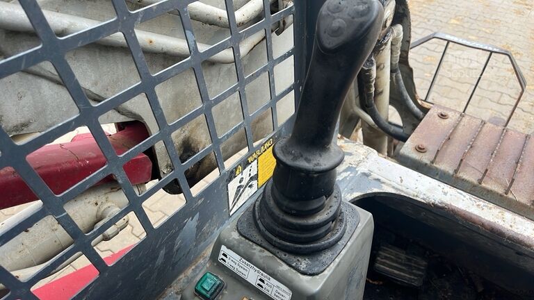 Kompaktlæsser på bælte Takeuchi TL130 with forks and loader bucket