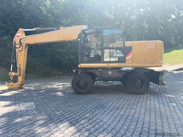 Riteņu ekskavators Caterpillar M320F