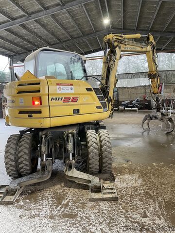 Kolesni bager New Holland MH 2.6