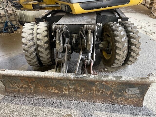 Kolesni bager New Holland MH 2.6