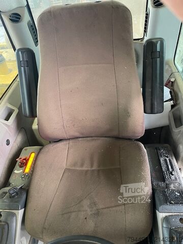 Kolesni bager New Holland MH 2.6