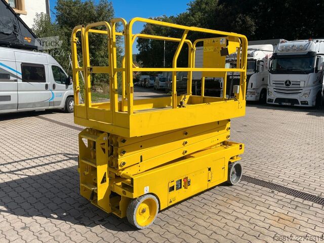Munkaplatform GENIE GS 2646 Scherenbühne Elektro AH 9,92 m 454 kg