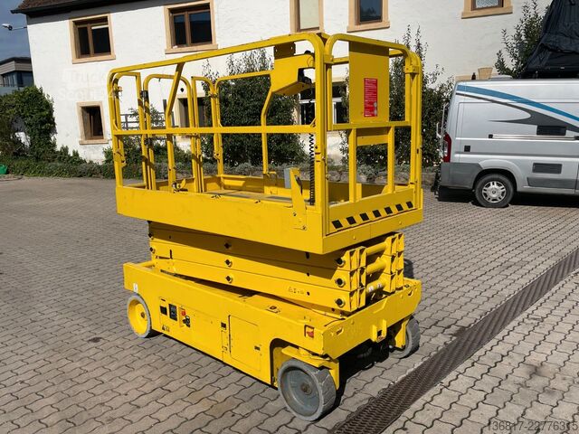 Munkaplatform GENIE GS 2646 Scherenbühne Elektro AH 9,92 m 454 kg