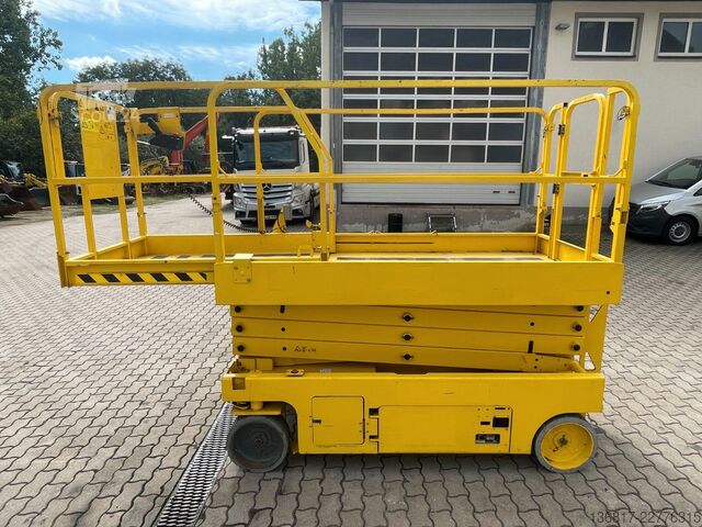 Munkaplatform GENIE GS 2646 Scherenbühne Elektro AH 9,92 m 454 kg