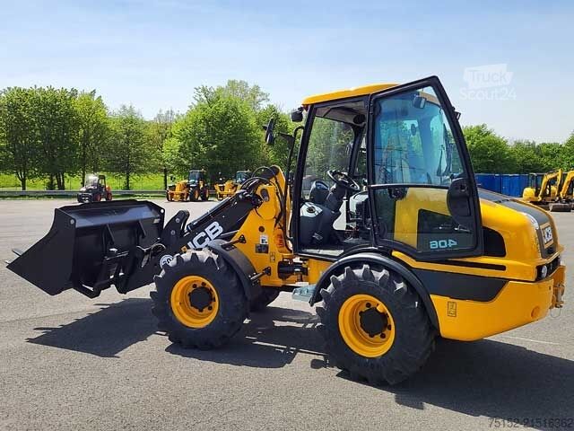 Wheel loader JCB 406 - NEU - inkl. Schaufel und Gabel
