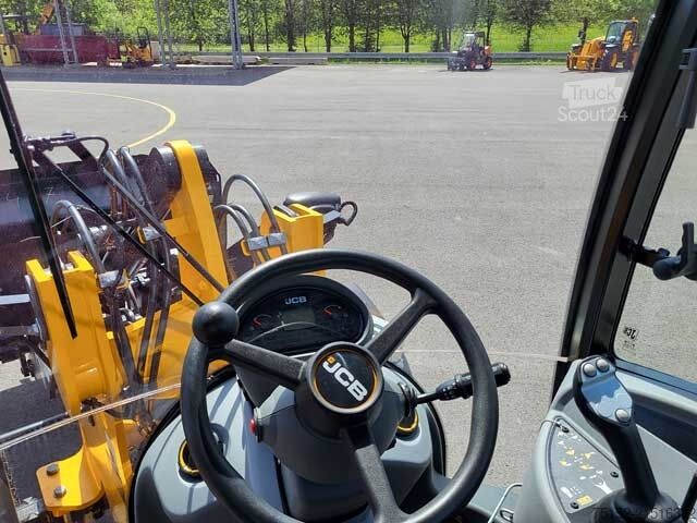 Wheel loader JCB 406 - NEU - inkl. Schaufel und Gabel