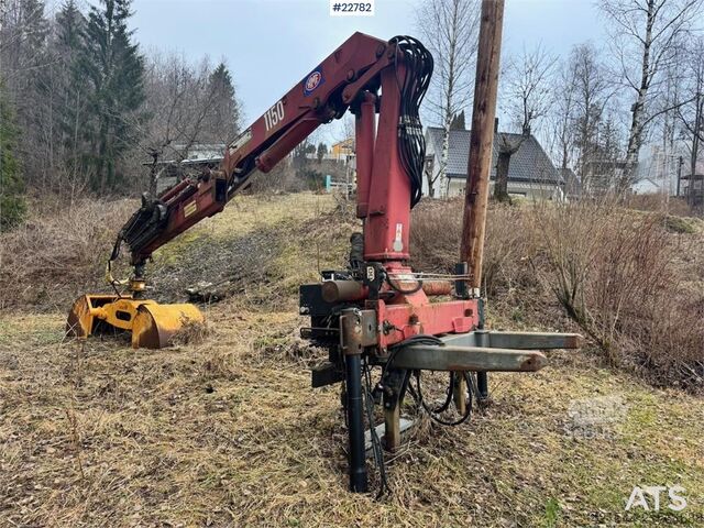 Outil de levage HMF 1150 crane with grab.