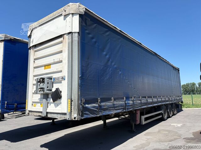 Open oplegger met zeil Fruehauf 