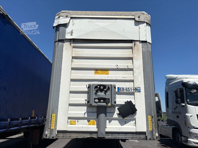 Open oplegger met zeil Fruehauf 