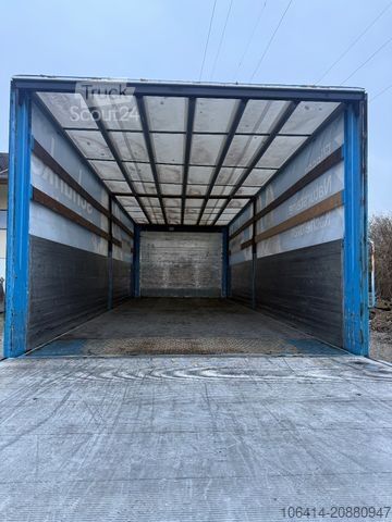 Camião plataforma com lona MAN TGM 18.340