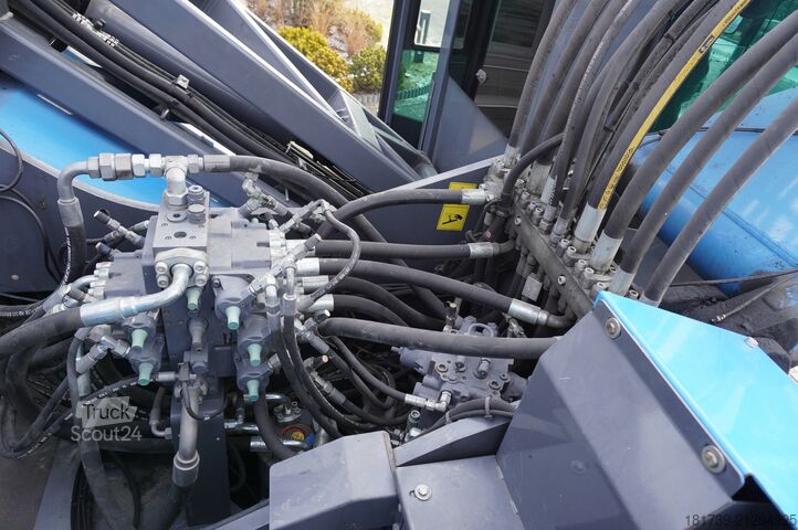 Material handler Fuchs MHL 340 S5 material handling excavator