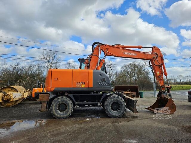 Escavadora sobre rodas HITACHI ZX 140 W