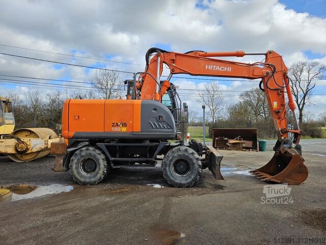 Escavadora sobre rodas HITACHI ZX 140 W