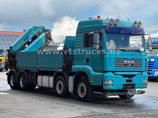 Camión de plataforma MAN TGA 35.430 8x4 BL Baustoff PALFINGER 72002 LK