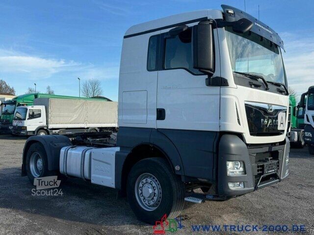 Стандартный седельный тягач MAN TGX 18.470 4x4 H-Drive Kipphydraulik Kühlschrank