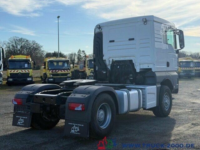 Стандартный седельный тягач MAN TGX 18.470 4x4 H-Drive Kipphydraulik Kühlschrank