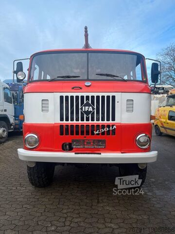 Truck with flatbed & tarpaulin IFA W50 LA Feuerwehr TLF