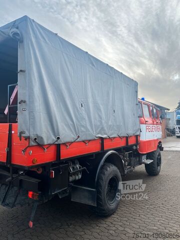 Truck with flatbed & tarpaulin IFA W50 LA Feuerwehr TLF