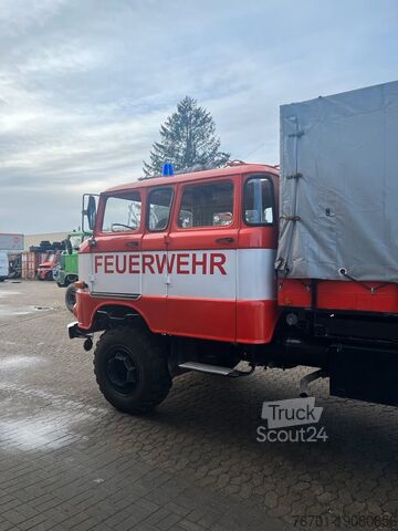 Truck with flatbed & tarpaulin IFA W50 LA Feuerwehr TLF