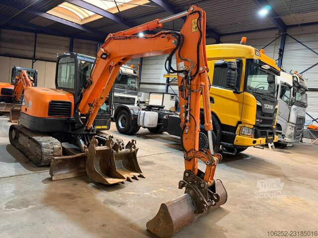 DOOSAN DX 62 R-3 6.2T - *FULL HYDR - *CENTRAL GREASING* - *HYDR QUICKHITCH - 3 BUCKETS / LÖFFELN - * DOOSAN DX 62 R-3 6.2T - *FULL HYDR - *CENTRAL GREASING...