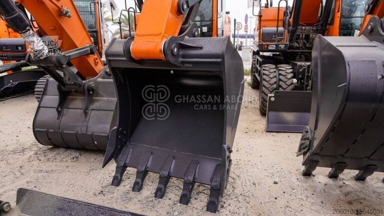 Колесный экскаватор Develon DX210WA