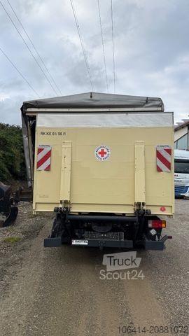 Transportador con plataforma y toldo IVECO ML 10(UNFALL)