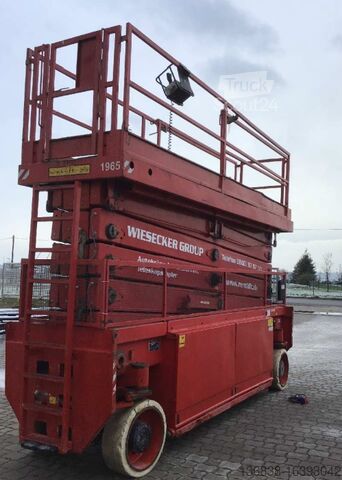 Ножичний підйомник Holland Lift Combistar N-265EL 13 4WDS Elektro 28m