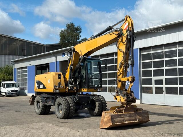 Tekerlekli ekskavatör CATERPILLAR M313D Mobilbagger 14,2 Tonnen