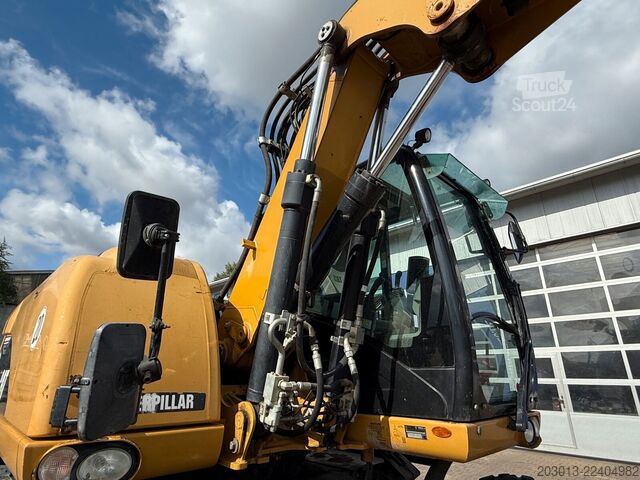 Gumikerekes kotrógép CATERPILLAR M313D Mobilbagger 14,2 Tonnen