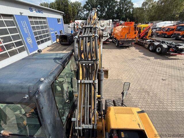 Gumikerekes kotrógép CATERPILLAR M313D Mobilbagger 14,2 Tonnen
