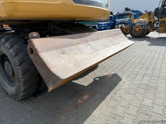 Gumikerekes kotrógép CATERPILLAR M313D Mobilbagger 14,2 Tonnen