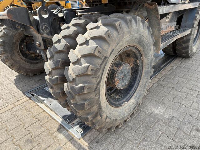 Gumikerekes kotrógép CATERPILLAR M313D Mobilbagger 14,2 Tonnen