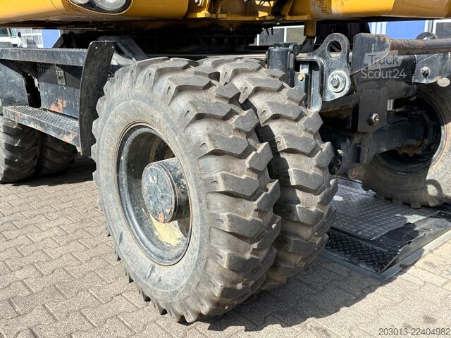 Gumikerekes kotrógép CATERPILLAR M313D Mobilbagger 14,2 Tonnen