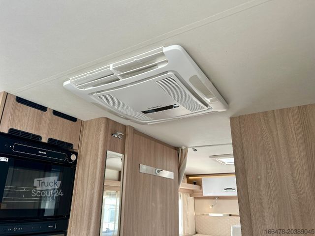 Інтегрований автокемпер LAIKA Kosmo 909 *Einzelbetten-Hubbett-Automatik*