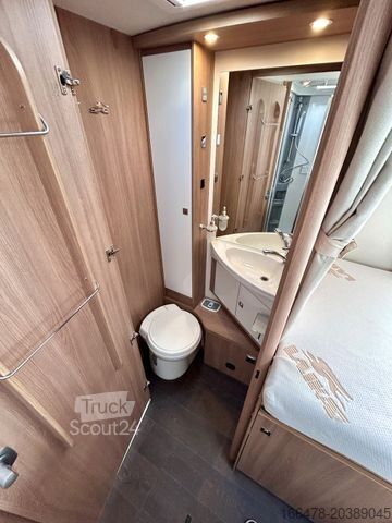 Інтегрований автокемпер LAIKA Kosmo 909 *Einzelbetten-Hubbett-Automatik*