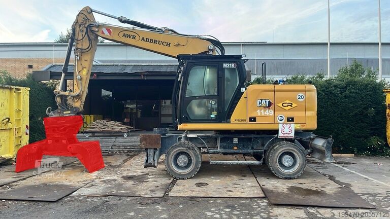 Bager na kolesih Caterpillar M318D