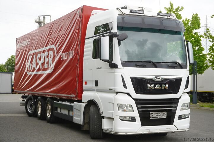 Plane MAN TGX 35.580 E6 8x4 /4 / 23 EPAL tarpaulin