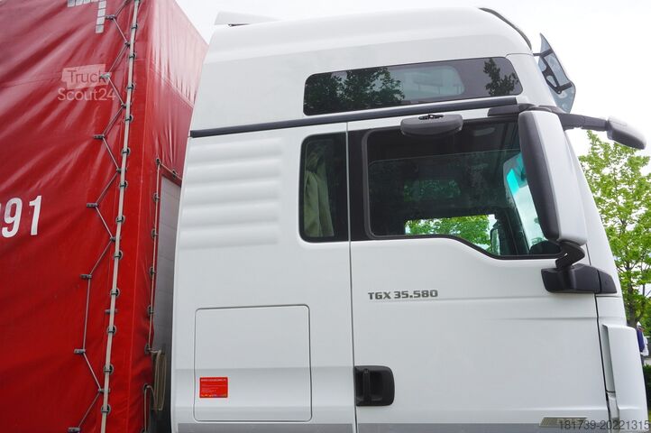 Plane MAN TGX 35.580 E6 8x4 /4 / 23 EPAL tarpaulin