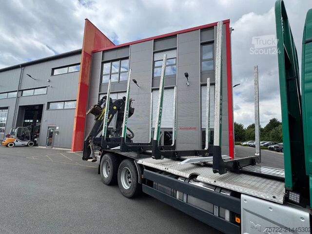 Timber transporter MAN TGX 33.580 33.580 6x4 BL Kurzholz mit TajfunLIV...