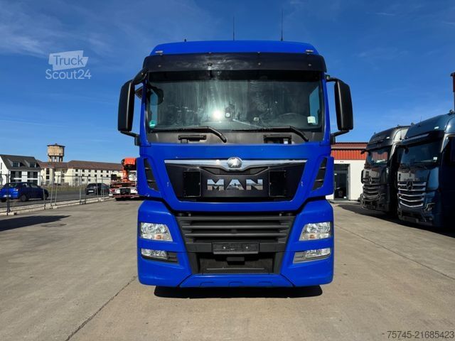 Camion plateau avec bâche MAN TGX 18.360 *  * RETARDER * AHK * 1. HAND *