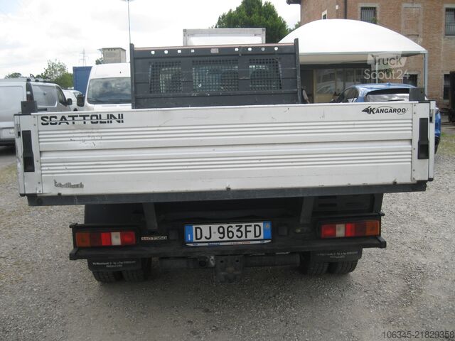 Kuorma-auto kiinteällä lavalla Ford Transit 350