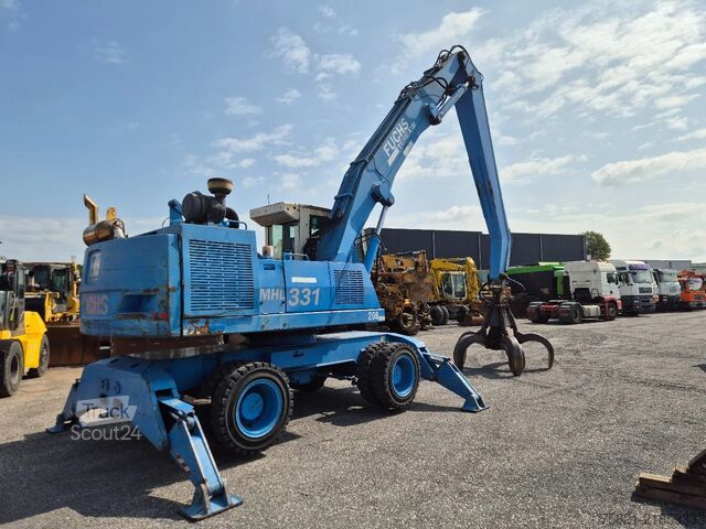 Materiālu apstrādes mašīna Fuchs MHL 331