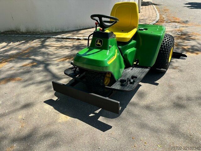 Βαν John-Deere 1200A Bunkerharke Motorrechen
