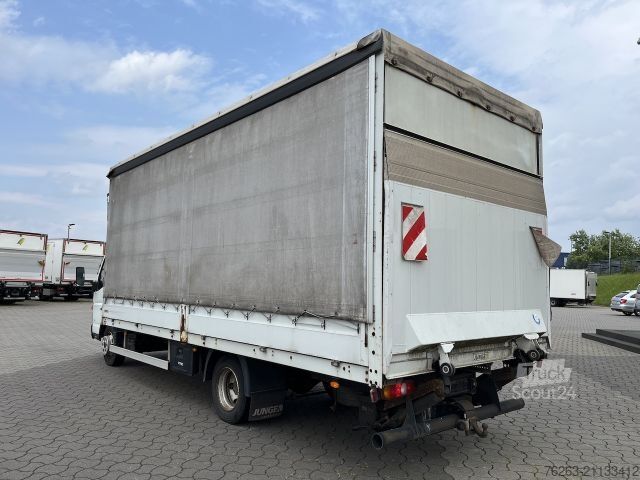 Transportador con plataforma y toldo FUSO Canter 7C18 4x2 Ladebordwand / Getriebeschaden