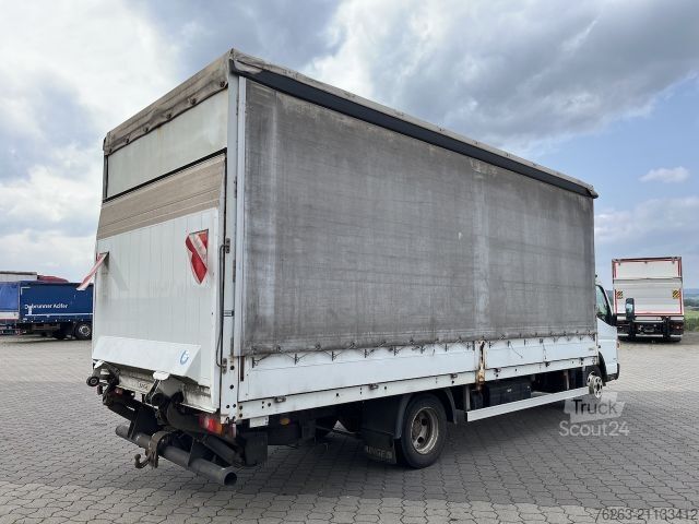 Transportador con plataforma y toldo FUSO Canter 7C18 4x2 Ladebordwand / Getriebeschaden