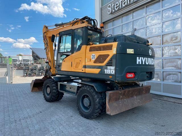 Escavatore gommato Hyundai HW 180 / 3.054h / hydr. Grabenräumer / Klima