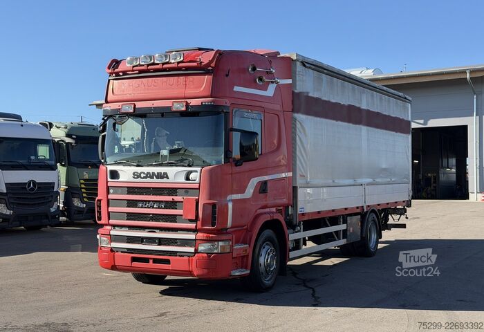 Camión plataforma con toldo Scania R164LB 4x2 Plane/HB / Swiss-Vehicle