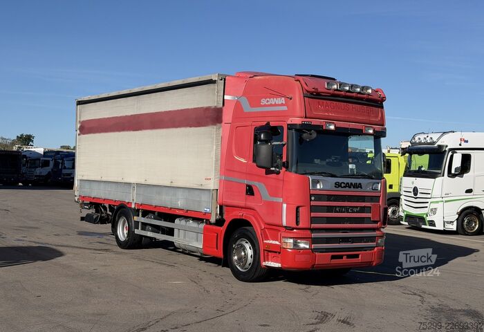 Camión plataforma con toldo Scania R164LB 4x2 Plane/HB / Swiss-Vehicle
